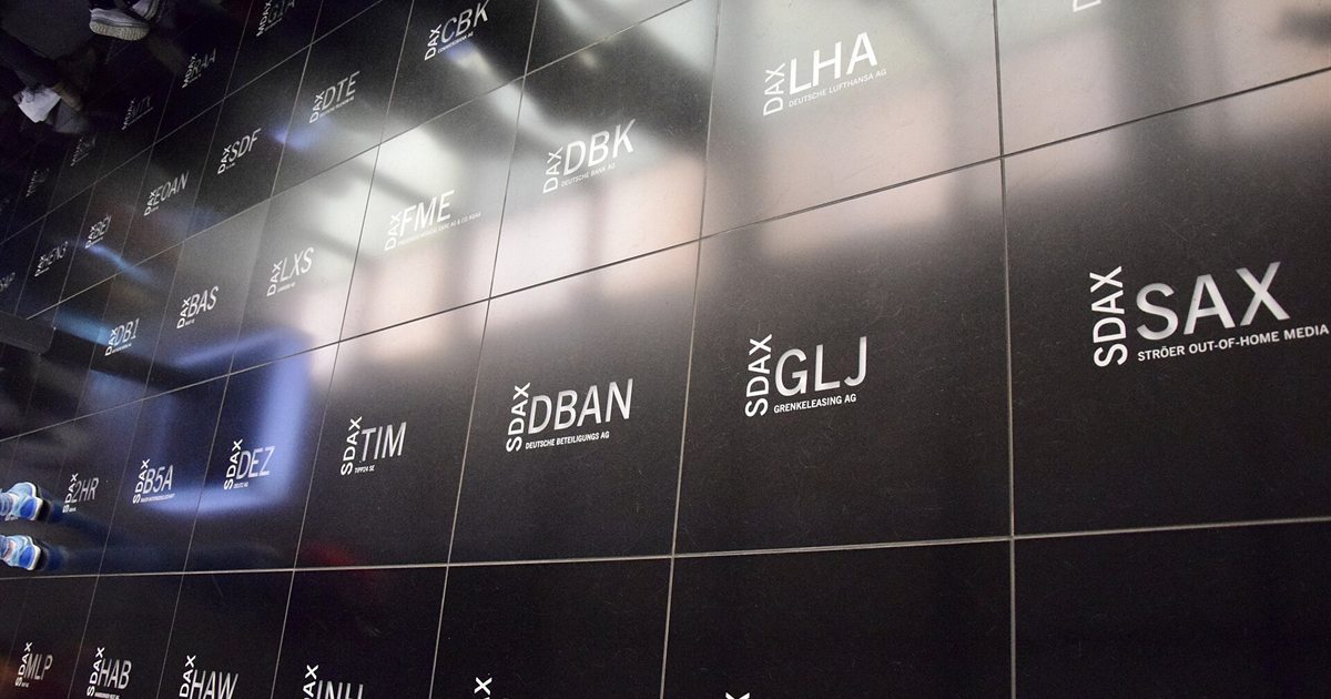 A board of stock ticker symbols at a stock exchange