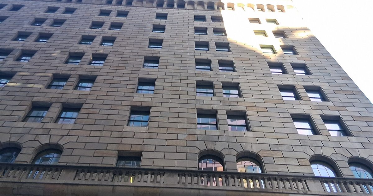 The stone facade of the Federal Reserve Bank of New York building in Lower Manhattan