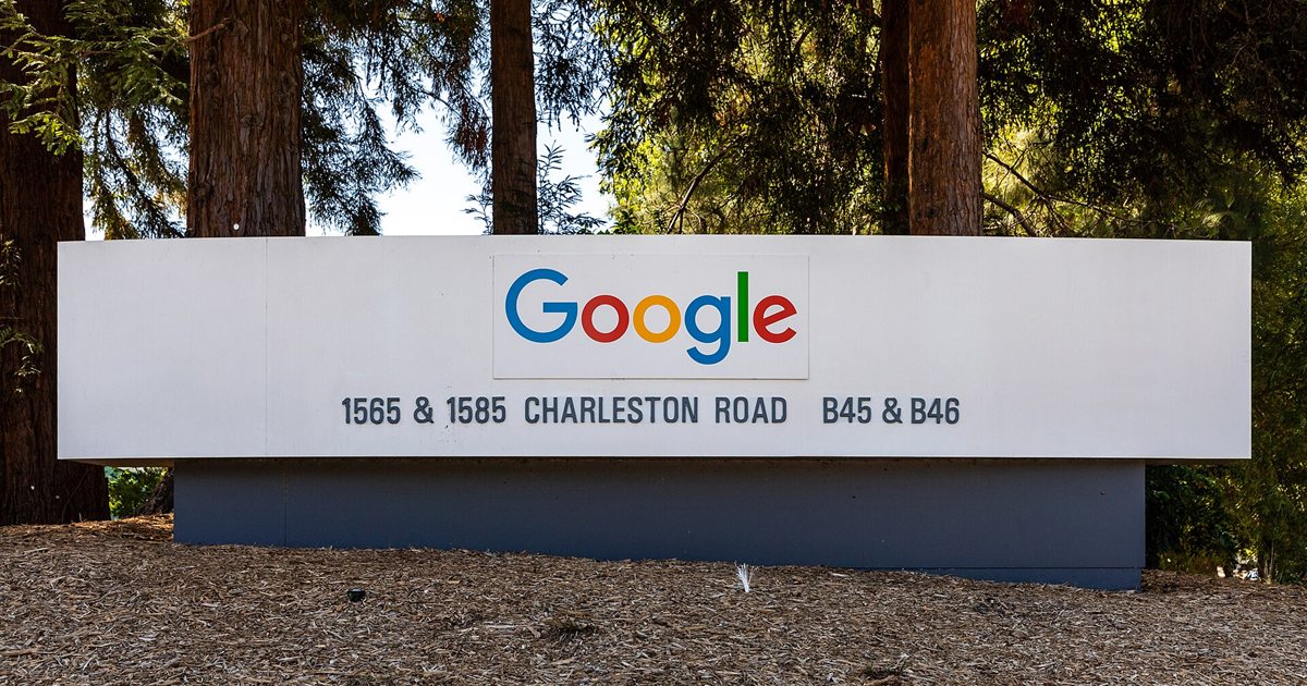 Google sign in front of trees on Charleston Road at the company's Mountain View, California campus