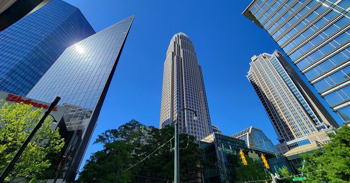 The Bank of America Corporate Center tower rising among glass skyscrapers in uptown Charlotte, North Carolina