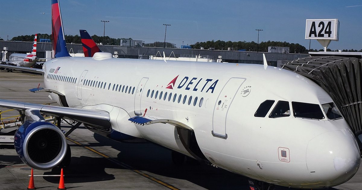 A Delta Air Lines Airbus A321 parked at a gate at Atlanta's Hartsfield-Jackson airport
