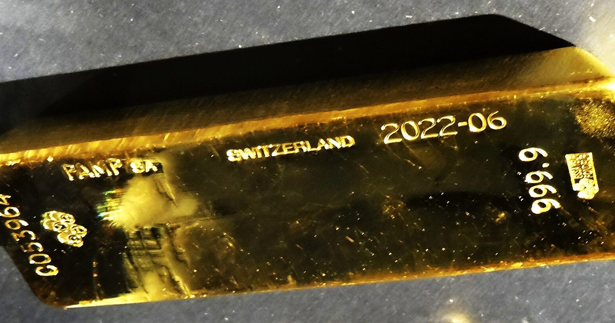 A close-up of a stamped gold bar from the Banque de France collection