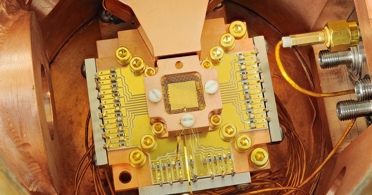 A gold-plated ion-trap chip used in trapped-ion quantum computing research at NIST